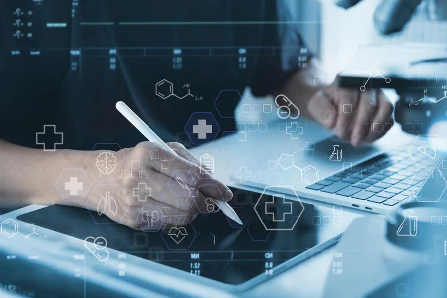 Close-up of a medical professional using a laptop and tablet, with illustrated medical symbols overlayed on the image, symbolizing health conditions treated by Proactive Wellness Centers in Loudoun County.